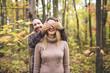 © Louis-Paul Photo - Couple in the autumn park.Smiling man and woman outside.
