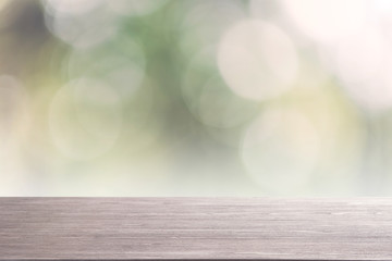 Wall Mural - top empty wood table on blurred abstract nature background. can be used for display or montage your product.