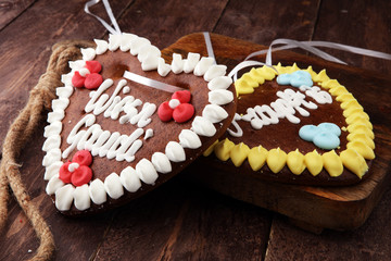 Wall Mural - original bavarian Oktoberfest gingerbread heart on wood.