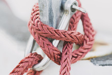 Red Rope Tied In A Secure Nautical Knot
