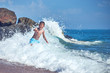 © Artem - Cute Caucasian boy in sea waves.