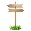© tassel78 - Wooden signboard in a grass.