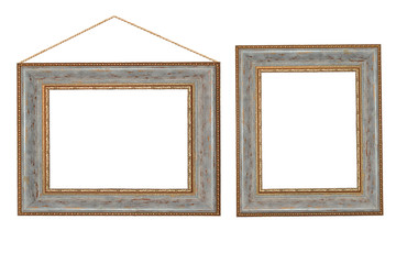 Two vintage baguettes in a gold frame on a white isolated background. A wooden frame with a picture.