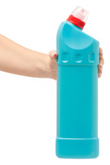 Bottle with toilet detergent household chemicals in a female hand