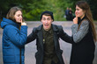 © yarohork - screaming man raised hands and girls try to calm him