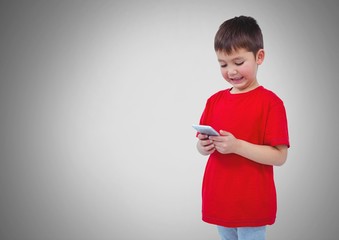 Canvas Print - Boy against grey background with phone