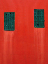 Green Windows On A Red Wall Background