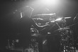 © WAVE/Stocksy - Drummer of a rock band on stage
