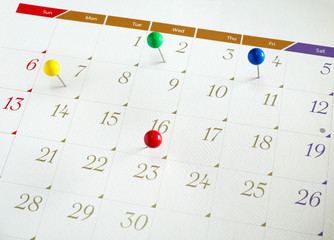 Wall Mural - Upcoming events. Calendar with thumbtacks as a concept of events