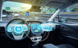 © metamorworks - Empty cockpit of autonomous car, HUD(Head Up Display) and digital speedometer. autonomous car. driverless car. self-driving vehicle.