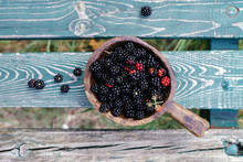 Ripe Blackberries In Wooden Dish