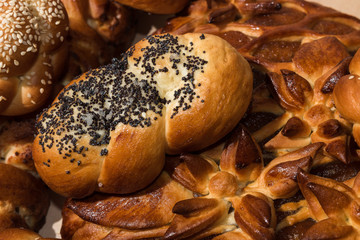 Different bakery products on a wooden background