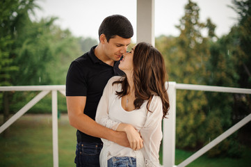 Wall Mural - Young couple in love on the outdoors background