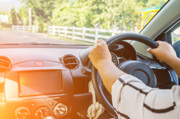 close-up of the hand of a woman driving For background