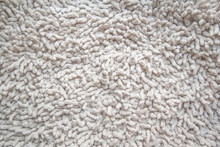 Texture Of A White Carpet With A Fringe