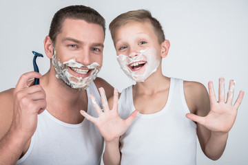 Wall Mural - father and son shaving together