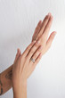 © Yuliya - female hands on a light background