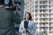 © ReeldealHD images - Female news presenter talking to camera