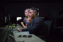 Operators In A Control Room At A Television Studio