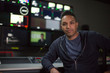 © ReeldealHD images - Portrait of a TV Producer in a control room