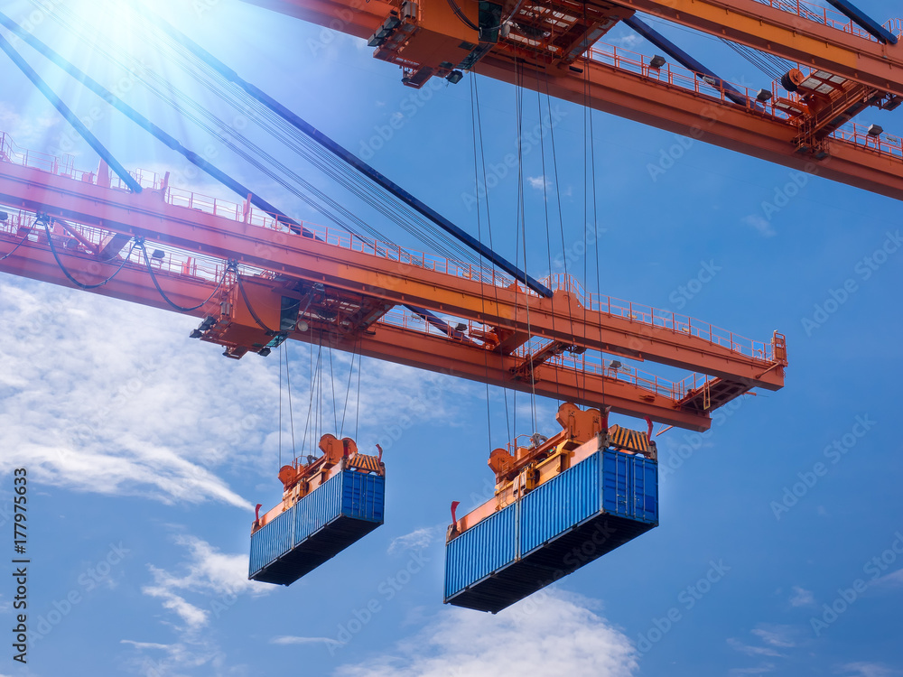Industrial port crane lift up loading export containers box onboard at ...