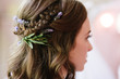 © Brian Powell/Stocksy - detail of bridal hair style with lavender and braid