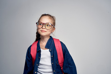 Wall Mural - girl in glasses looks into the distance