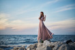 © SHOTPRIME STUDIO - beautiful woman in a dress on the coast by the sea, nature