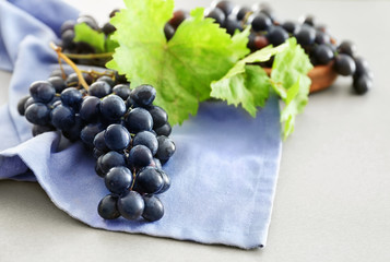 Fresh ripe grapes on table