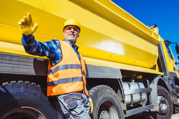 Wall Mural - Builders and  tip truck