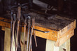 © Gabriel (Gabi) Bucataru/Stocksy - Rusty old tools in a blacksmith shop