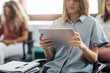 © LStockStudio - Schoolgirl Reading on Tablet