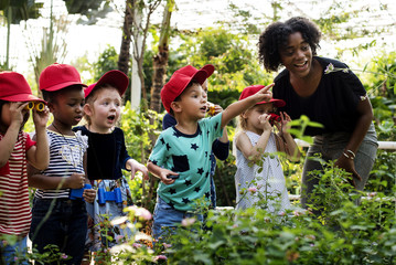 Wall Mural - Teacher and kids school learning ecology gardening