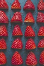 Overhead Of Strawberries On Blue Background.
