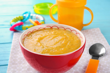 Sticker - Bowl of creamy baby vegetable soup on table