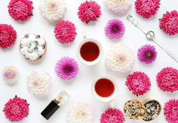  Styled scene with red, pink, white aster & dahlia blooms, feminine flat lay