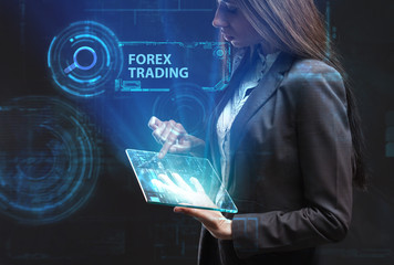 The concept of business, technology, the Internet and the network. A young entrepreneur working on a virtual screen of the future and sees the inscription: Forex trading