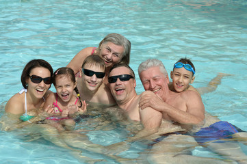 Wall Mural - Family relaxing in  pool