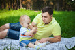 © luckyphoto - man resting with his son