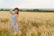 © lenblr - Beautiful woman in dress on a wheat field