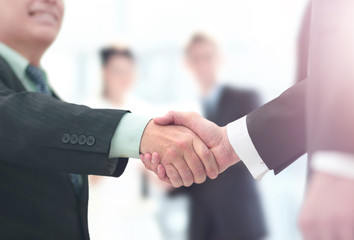 Concept of partnership - handshake  business partners