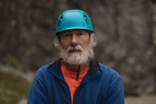 Senior Man Wearing Protective Helmet
