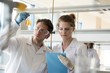 © Wavebreak Media - Students doing experiment in laboratory