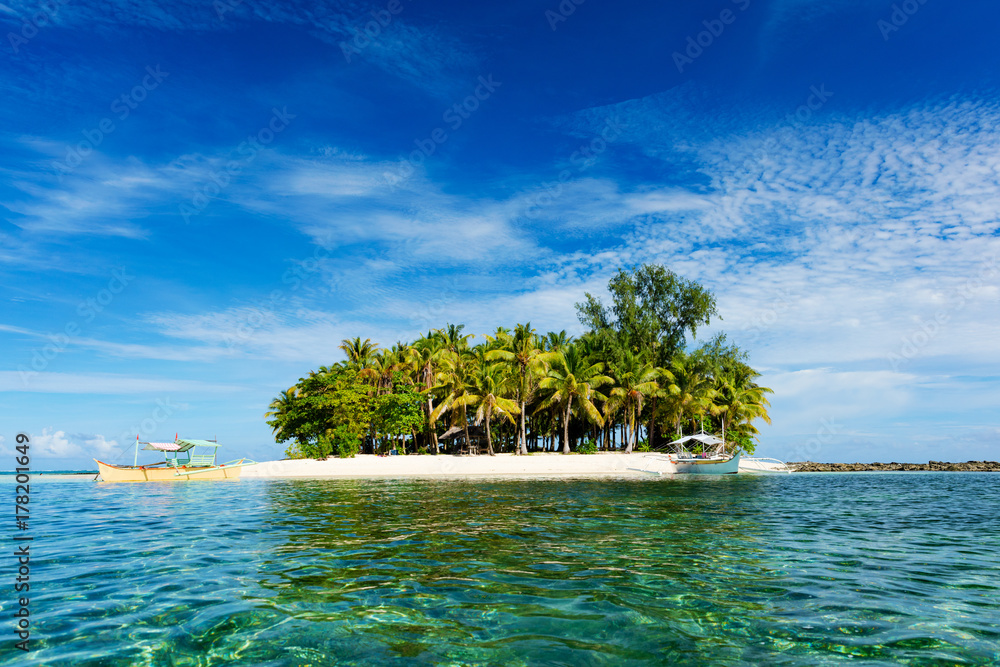 Tropical Guyam Island with traditional fishing boats - obrazy, fototapety, plakaty 