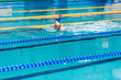 © Rychko Yevhen - woman swimming with swimming hat in swimming pool