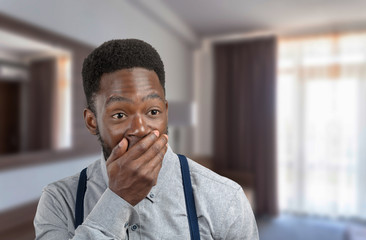 Wall Mural - Black man covering his mouth