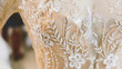 canvas print picture - Background,, embroidered lace. Delicate detail of a wedding dress close-up.