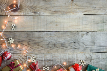 Christmas presents on wooden table top background