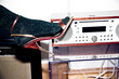 © Sari Wynne Ruff/Stocksy - Sparkle sock in high heel with radio