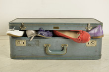 Flats In Old Retro Suitcase